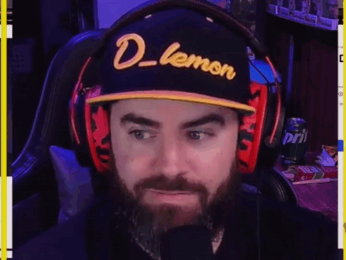 Bearded Man in Hat and Headphones