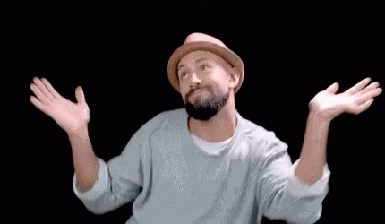 Bearded Man in Hat and Sweater Dancing