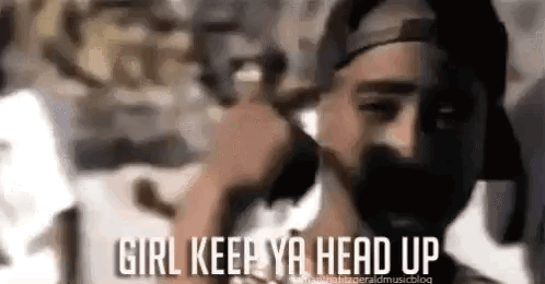 Bearded Man in Hat Holding Gun Says Girl Keep Ya Head Up