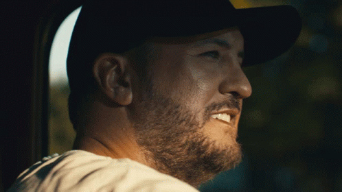 Bearded Man in Hat Smiling