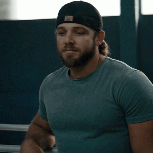 Bearded Man in Hat with Yes Sir Shirt