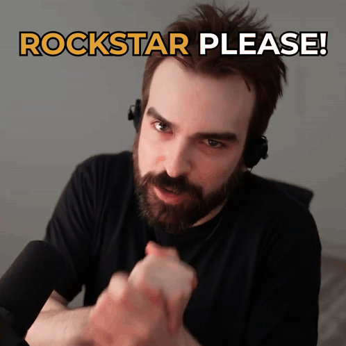 Bearded Man in Headphones Says Rockstar Please