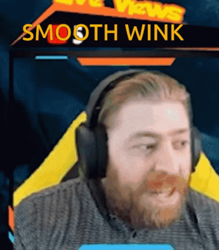 Bearded Man in Headphones with Smooth Wink Sign