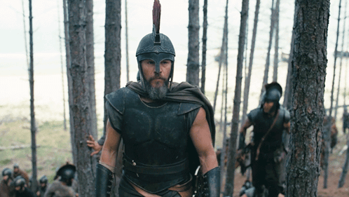 Bearded Man in Helmet Walking Forest