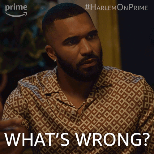Bearded Man in Patterned Shirt Saying What's Wrong
