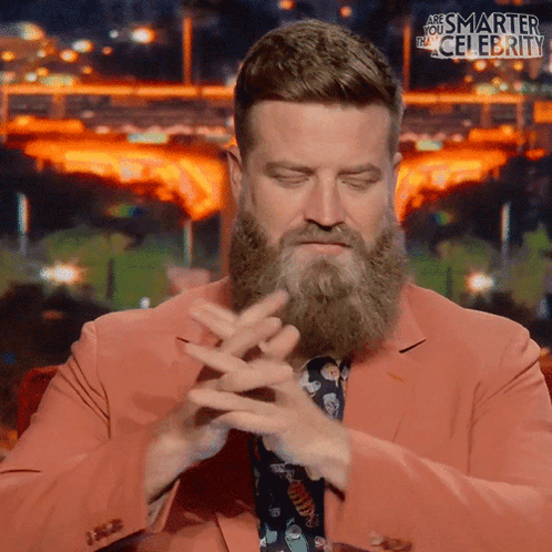 Bearded Man in Pink Suit and Tie