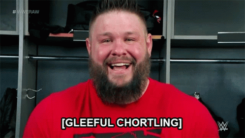 Bearded Man in Red Shirt Gleeful Chortling