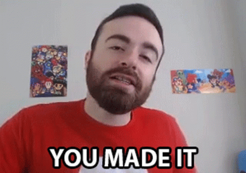 Bearded Man in Red Shirt Saying You Made It