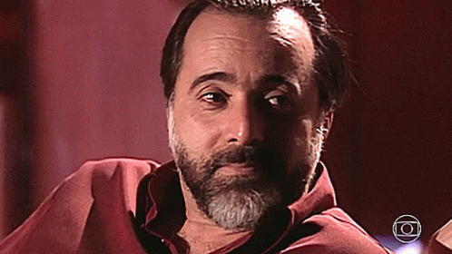 Bearded Man in Red Shirt With Circle Around Head