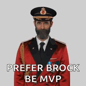 Bearded Man in Red Suit and Hat Giving OK Sign