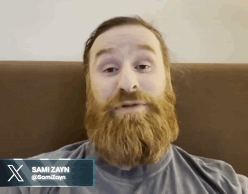 Bearded Man in Sami Zayn Shirt
