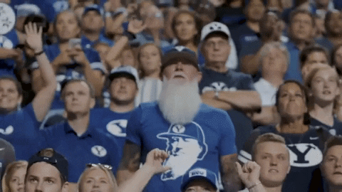 Bearded Man in Shirt Saying Y
