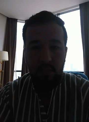 Bearded Man In Striped Shirt GIF