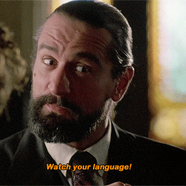 Bearded Man in Suit Says Watch Your Language
