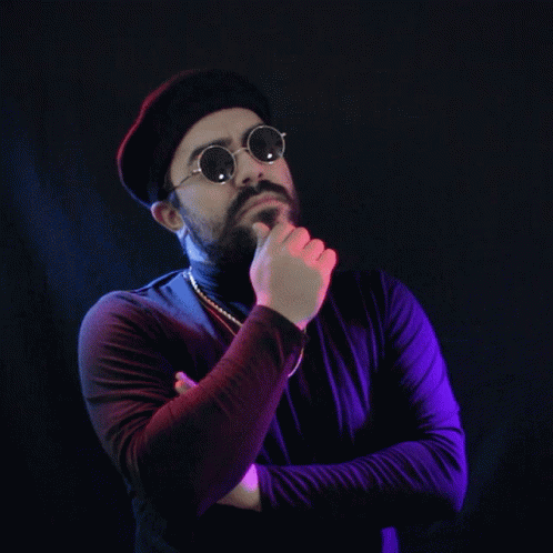 Bearded Man in Sunglasses and Beret Hand on Chin