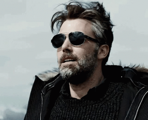 Bearded Man in Sunglasses and Black Jacket