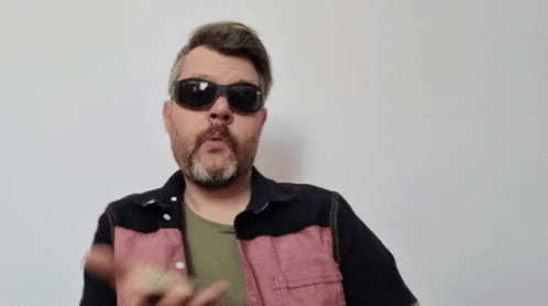 Bearded Man in Sunglasses and Black Pink Shirt