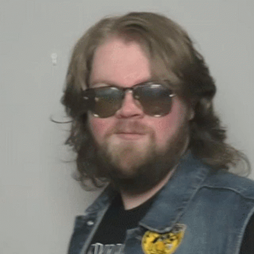 Bearded Man in Sunglasses and Black Shirt