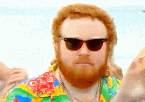 Bearded Man in Sunglasses and Colorful Shirt
