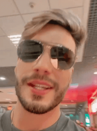 Bearded Man In Sunglasses And Grey Shirt GIF