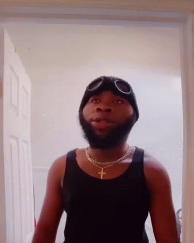 Bearded Man in Tank Top and Goggles