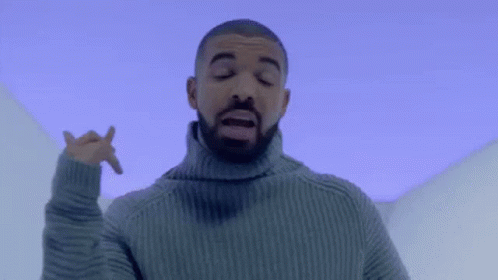 Bearded Man In Turtleneck Under Blue Sky GIF