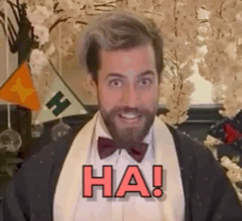 Bearded Man in Tuxedo Smiling Says Ha