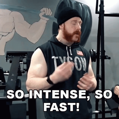 Bearded Man In Tyson Shirt In Gym GIF