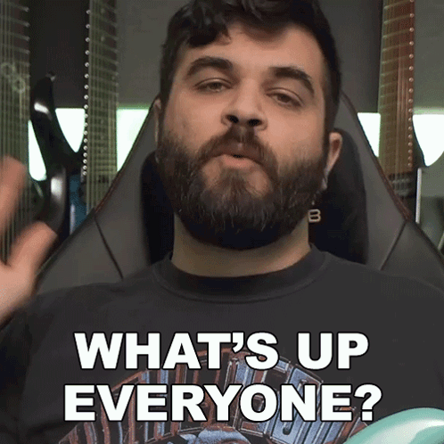 Bearded Man in What's Up Everyone Shirt