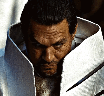 Bearded Man In White Coat Holding Sword GIF