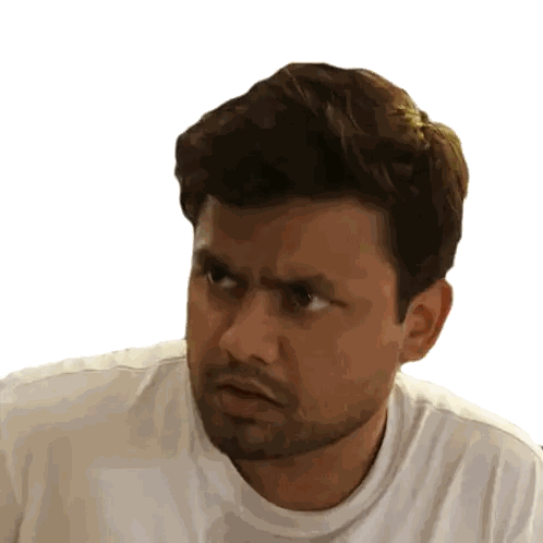 Bearded Man in White Shirt Making Face