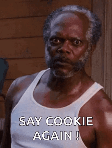 Bearded Man in White Tank Top Saying Say Cookie Again