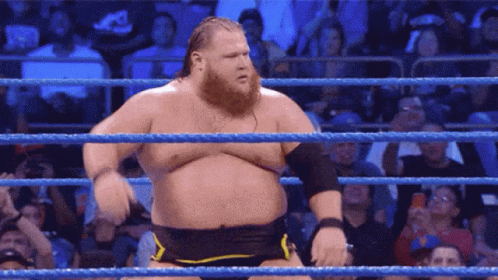 Bearded Man in Wrestling Ring With Crowd