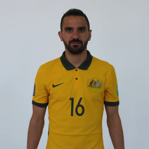 Bearded Man in Yellow Jersey Number 16