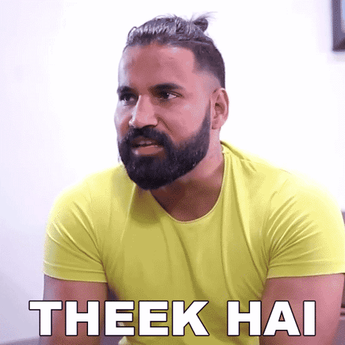 Bearded Man in Yellow Shirt Saying Theek Hai