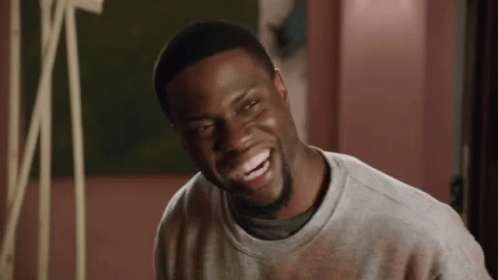 Bearded Man Laughing in Grey Sweater