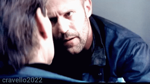 Bearded Man Looking at Another Man's Face 2022