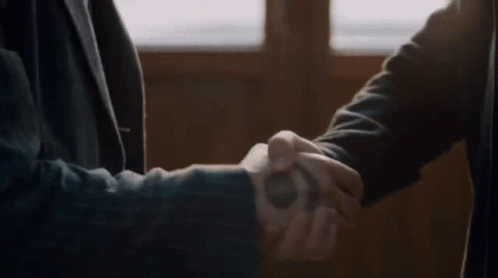 Bearded Man Looking At Another Man GIF