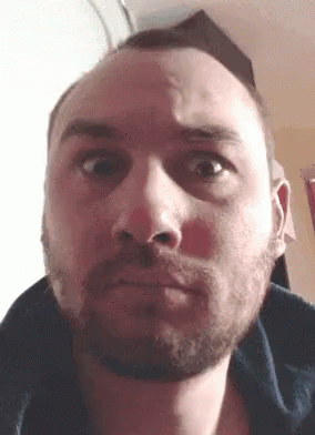 Bearded Man Looking Seriously at Camera
