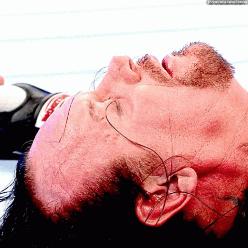 Bearded Man Lying Down with Eyes Closed