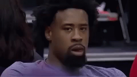 Bearded Man Making Funny Face at Basketball Game