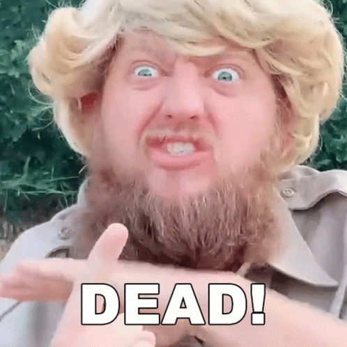 Bearded Man Making Funny Face Pointing at Dead
