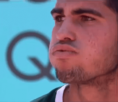 Bearded Man Making Funny Face With Blue Q GIF