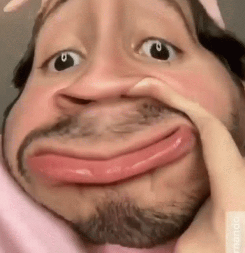 Bearded Man Making Funny Face With Hand On Face GIF