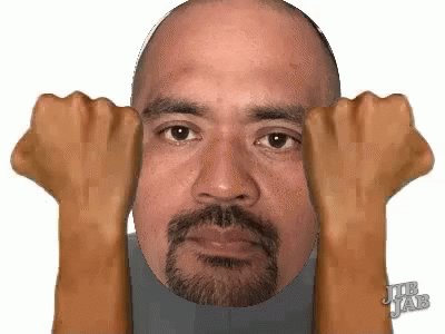 Bearded Man Making Funny Face With Hands