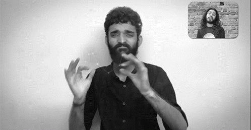 Bearded Man Making Hand Gesture GIF