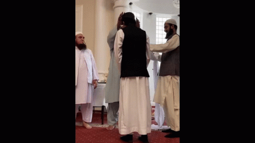 Bearded Man Next to Group of Men