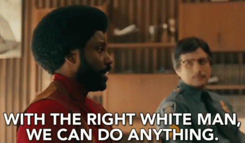 Bearded Man Next To Police Officer Saying With The Right White Man We Can Do Anything GIF