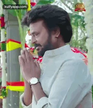 Bearded Man Praying At Temple GIF