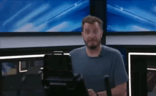 Bearded Man Riding Exercise Bike